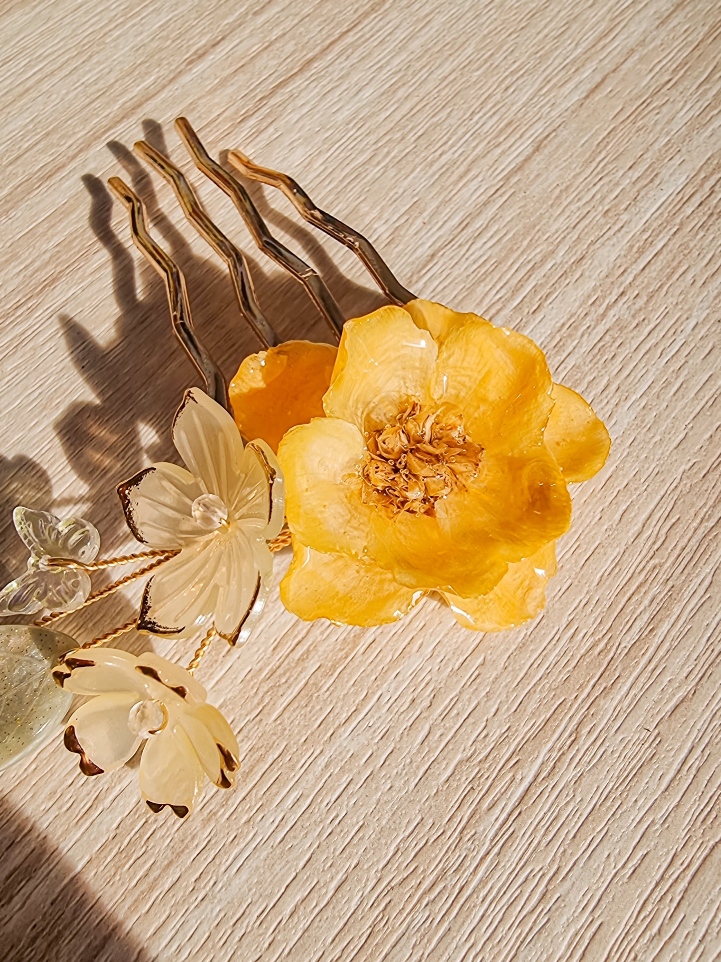Yellow abutilon on gold hairpin