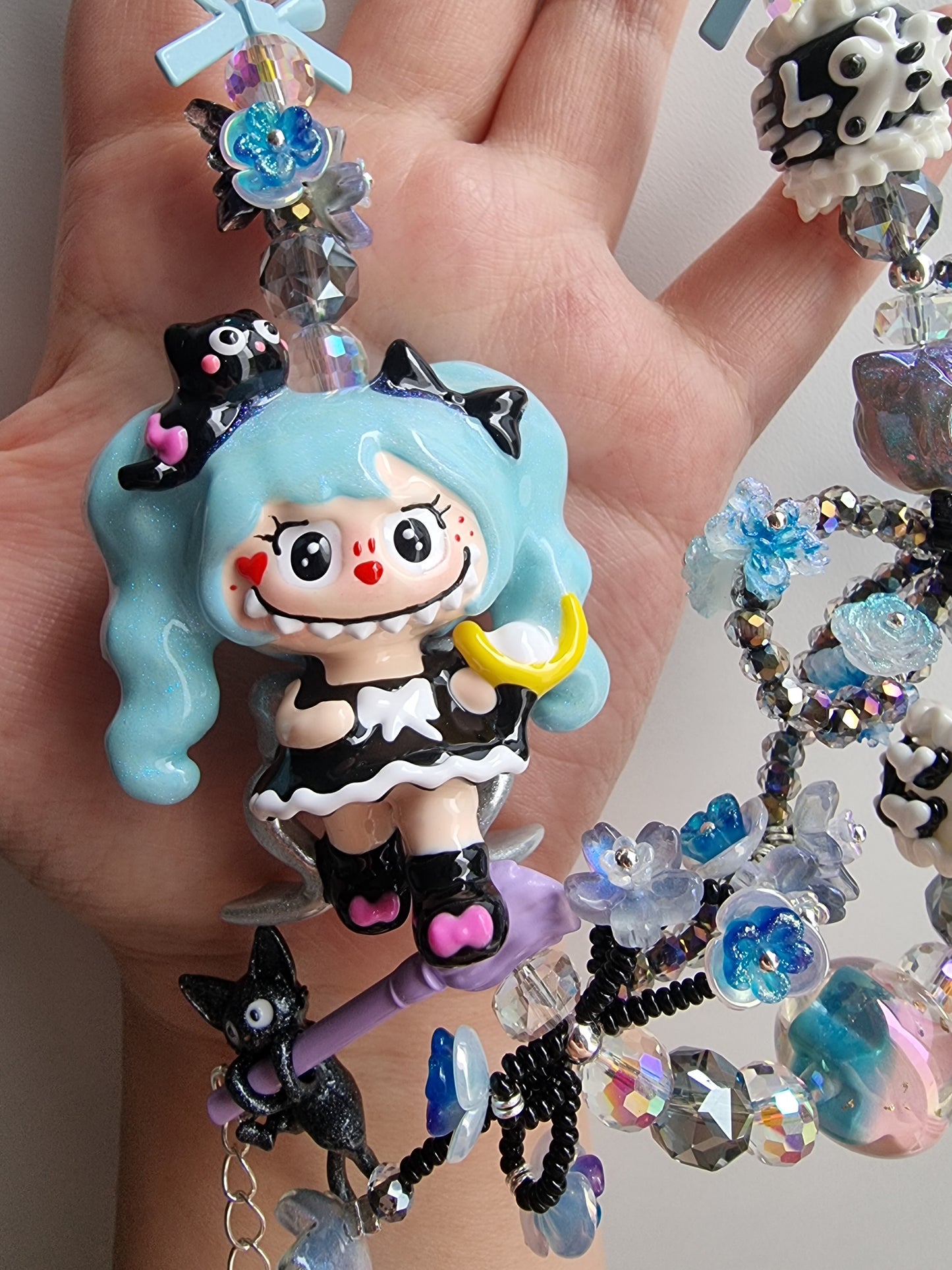 Handpainted labubu with blue hair strap