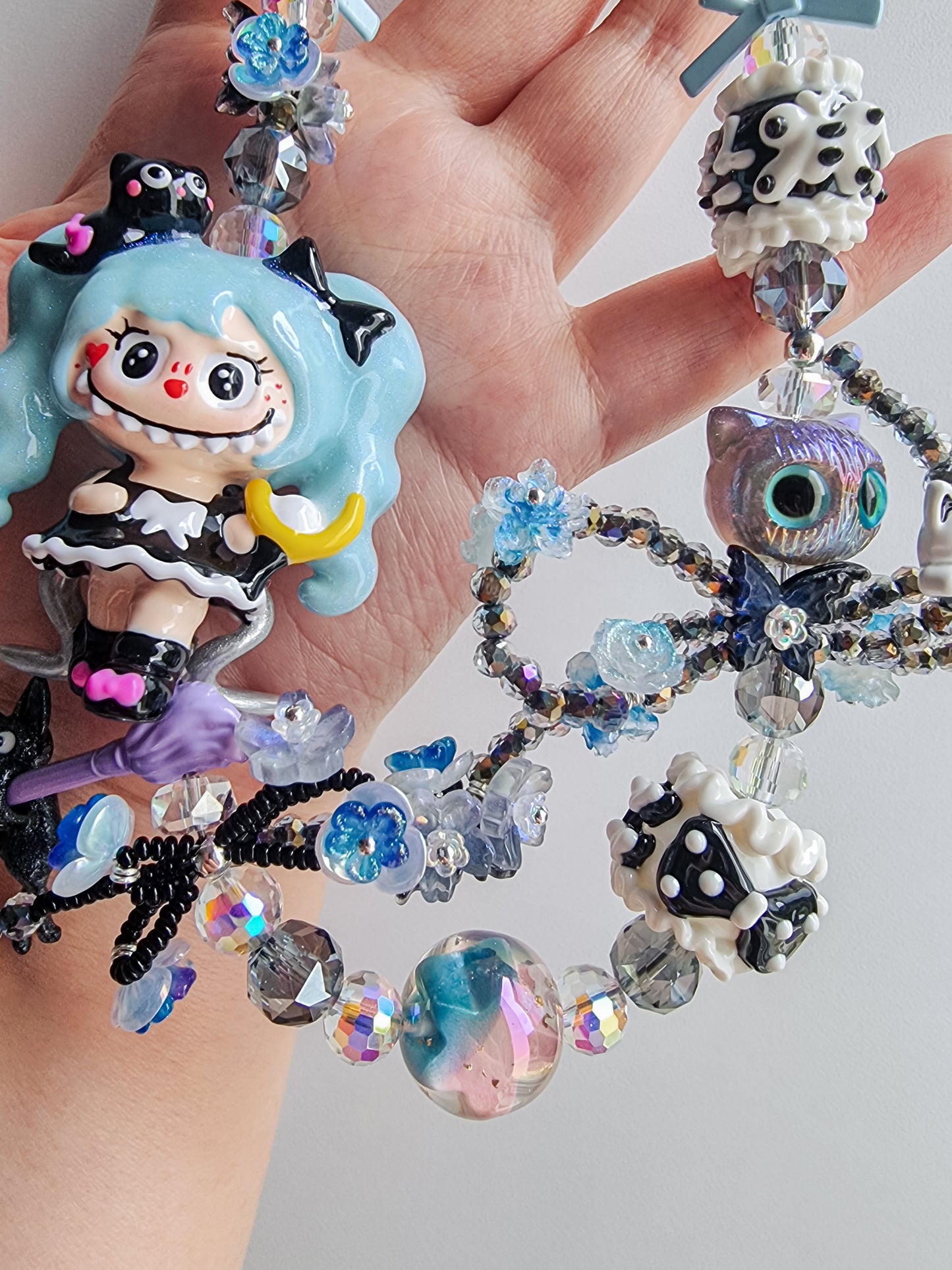 Handpainted labubu with blue hair strap