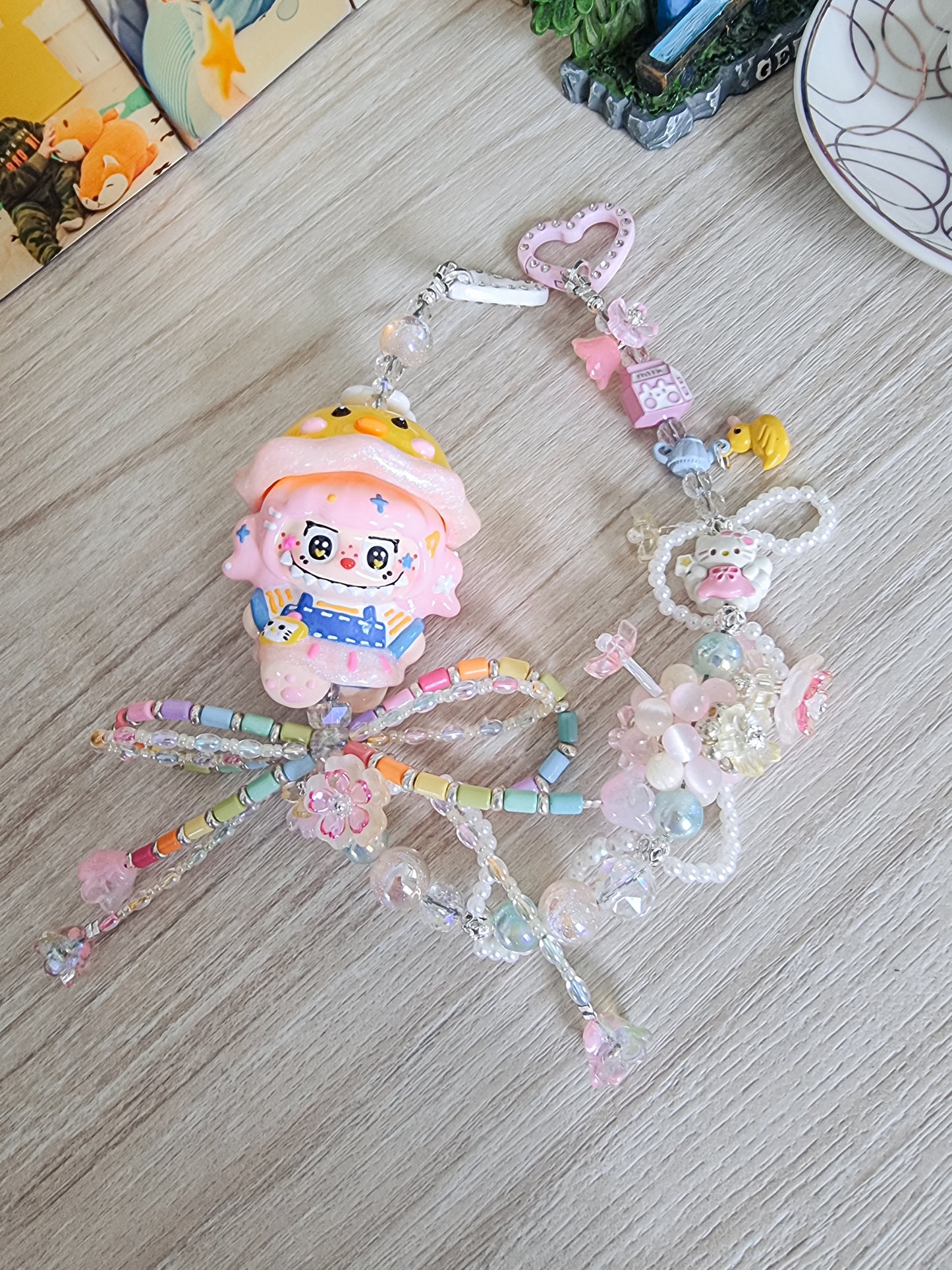 Handpainted Labubu wearing a spinner ducky hat strap