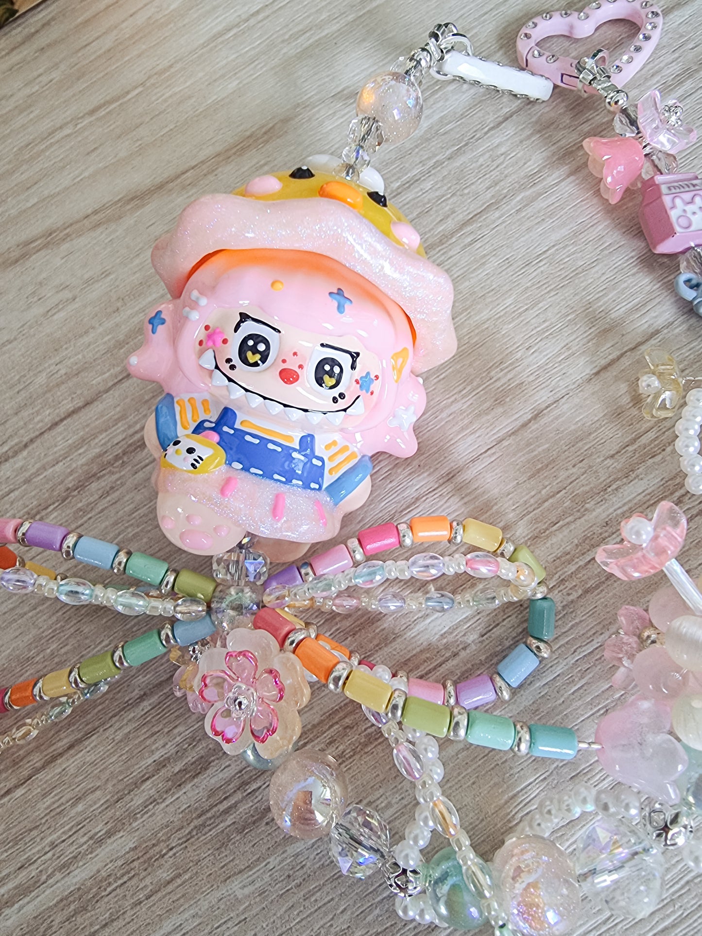 Handpainted Labubu wearing a spinner ducky hat strap