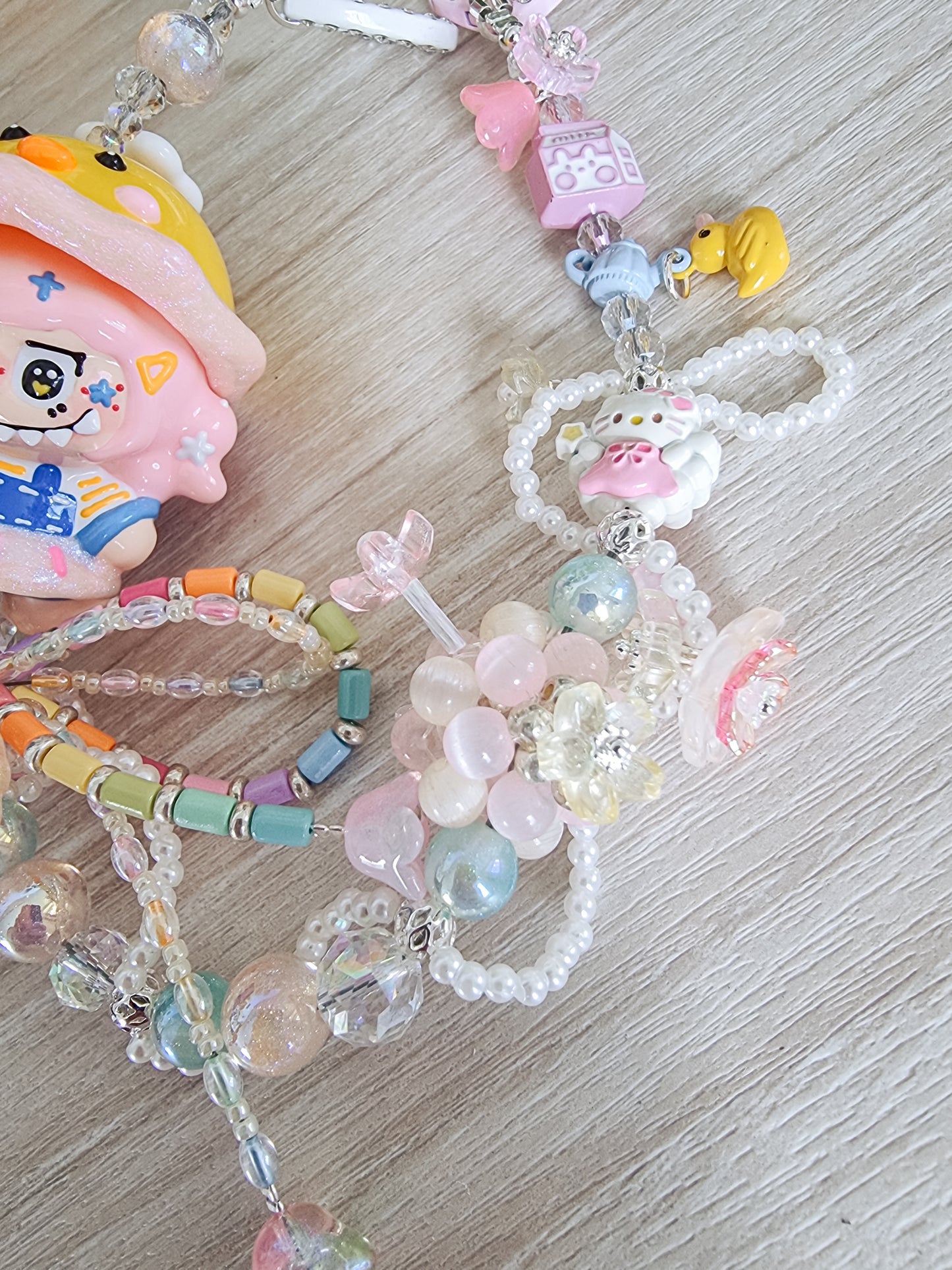 Handpainted Labubu wearing a spinner ducky hat strap