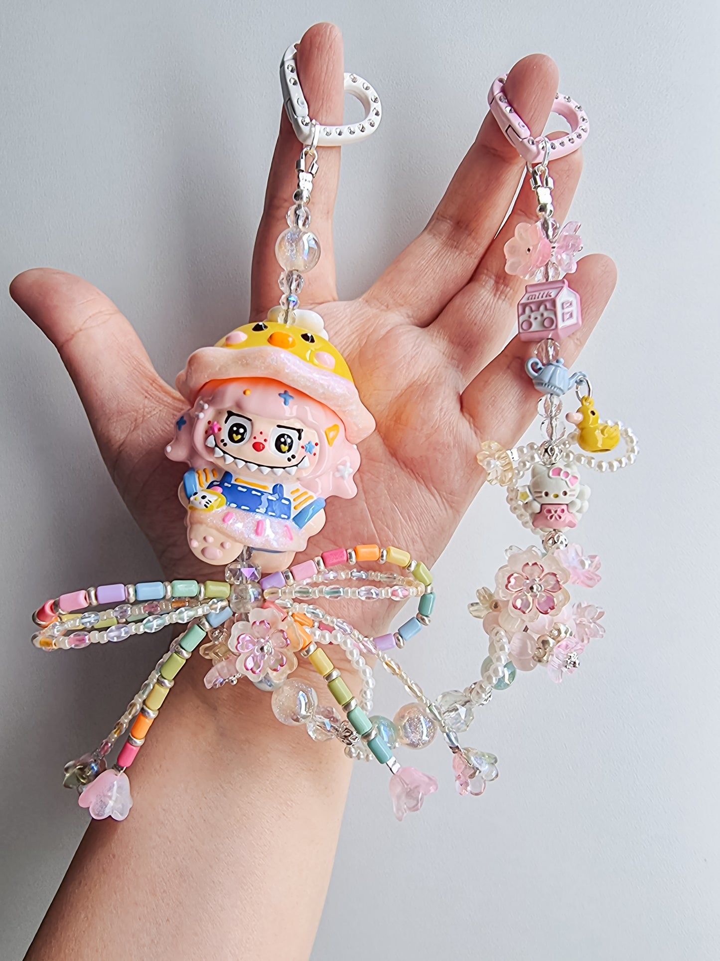 Handpainted Labubu wearing a spinner ducky hat strap