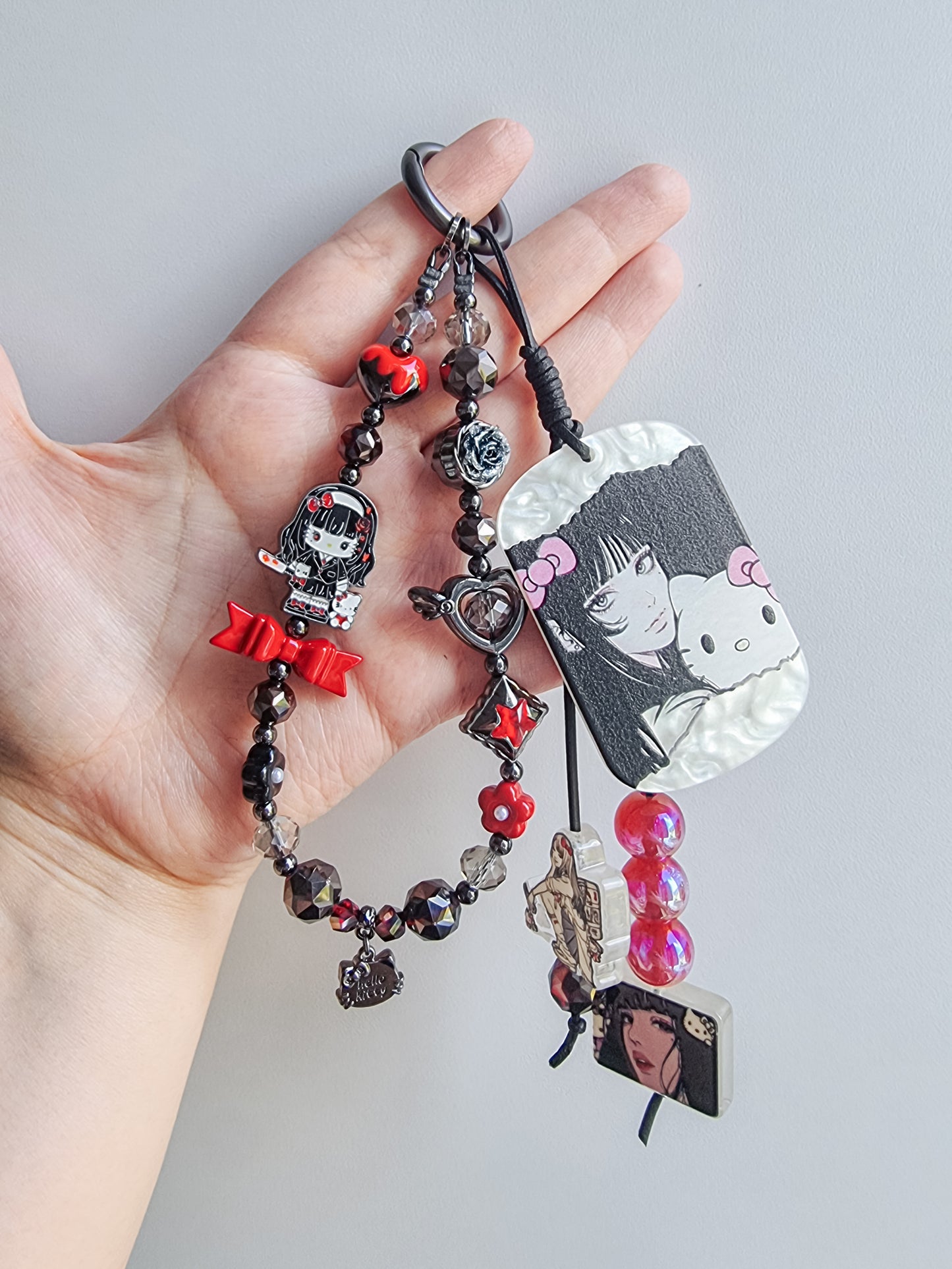 Evil kitty Tomie Kawakami phone / bag strap