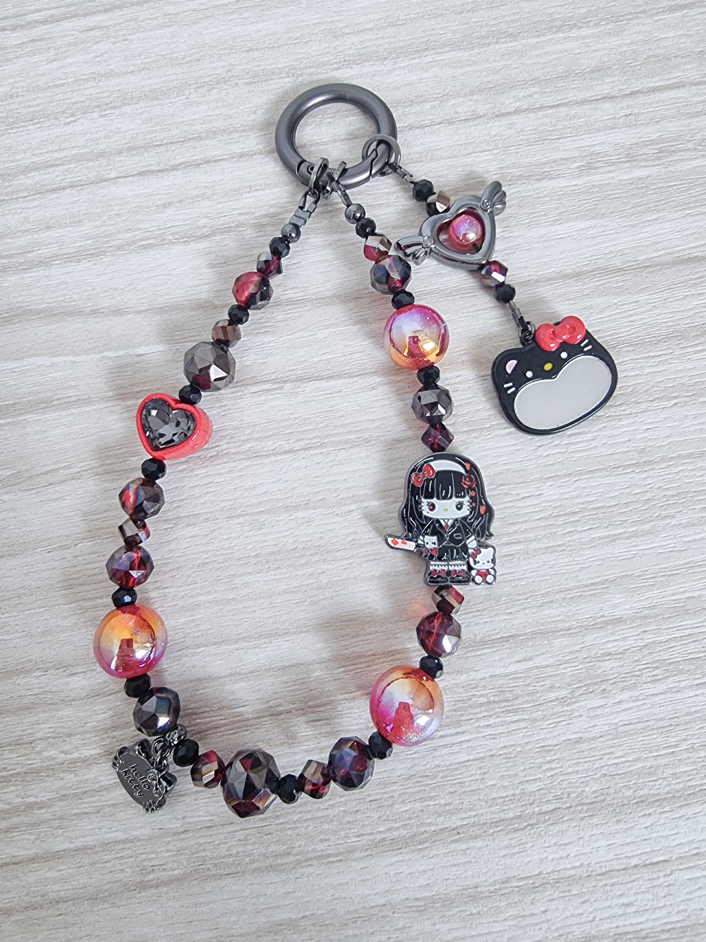 Evil kitty Tomie Kawakami phone / bag strap