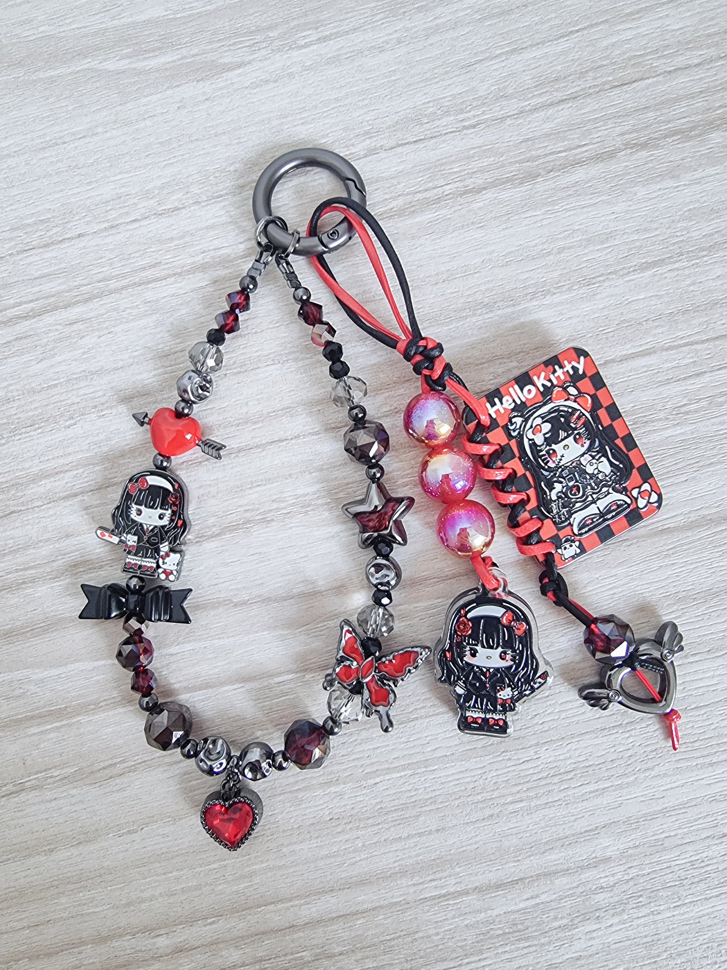 Evil kitty Tomie Kawakami phone / bag strap