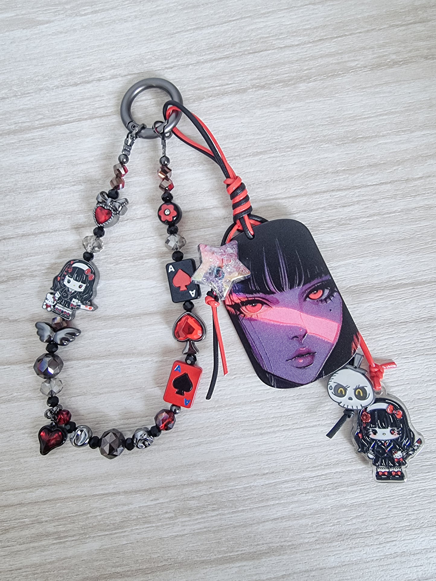 Evil kitty Tomie Kawakami phone / bag strap