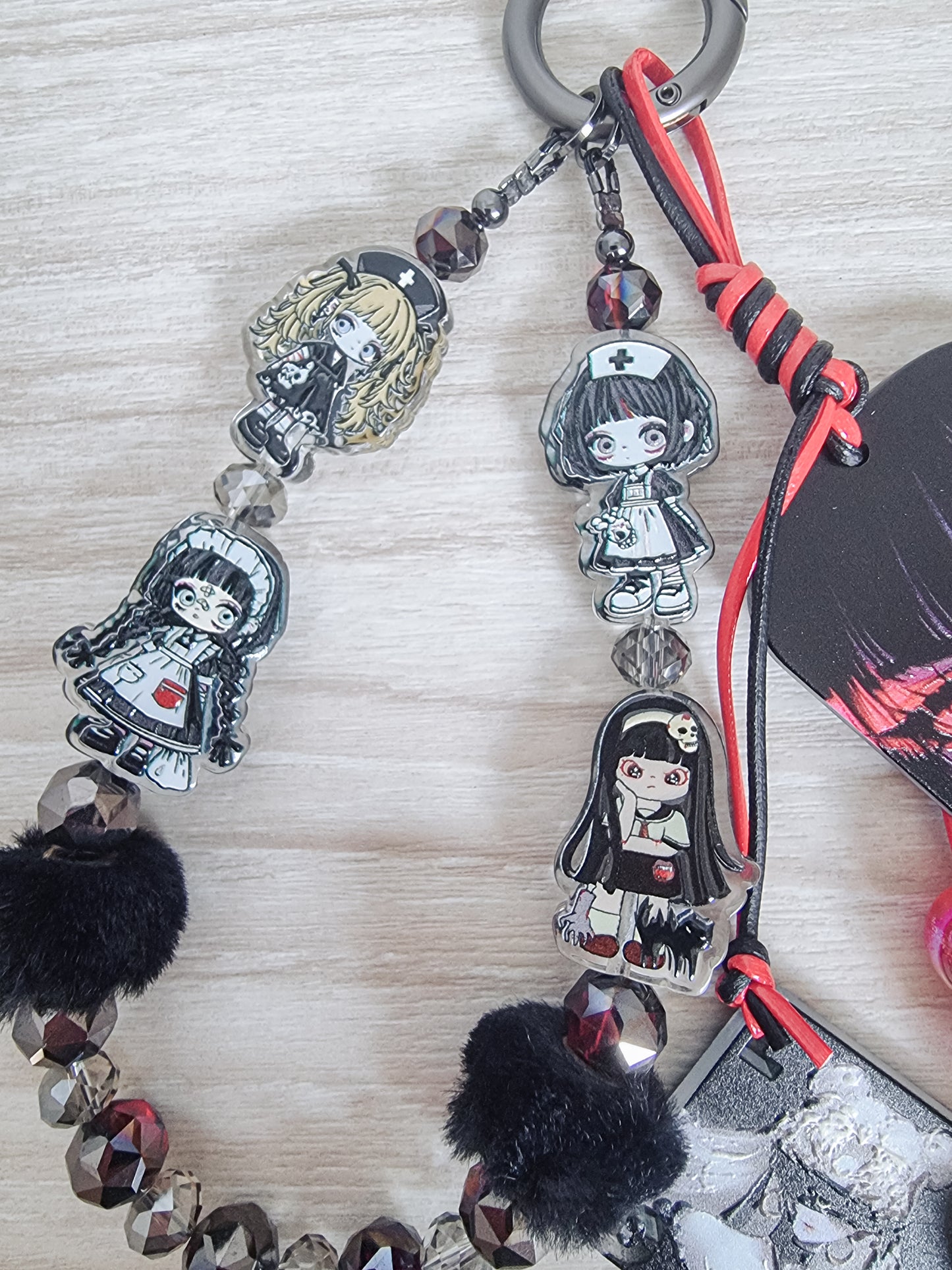 Evil kitty Tomie Kawakami phone / bag strap