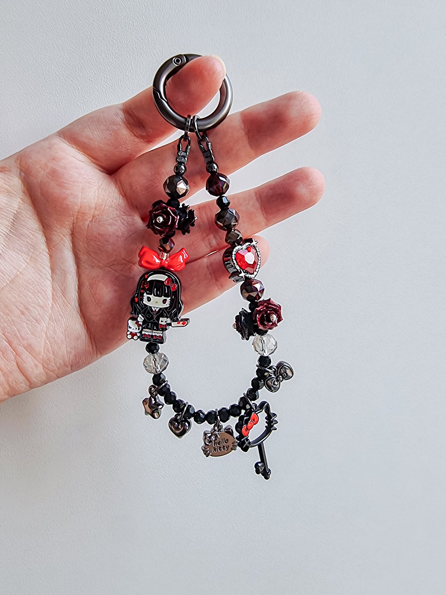 Evil kitty Tomie Kawakami phone / bag strap